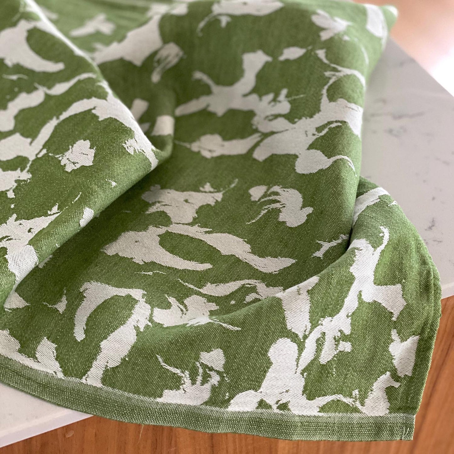 Plesner Patterns kjøkkenhåndkle i grønt.