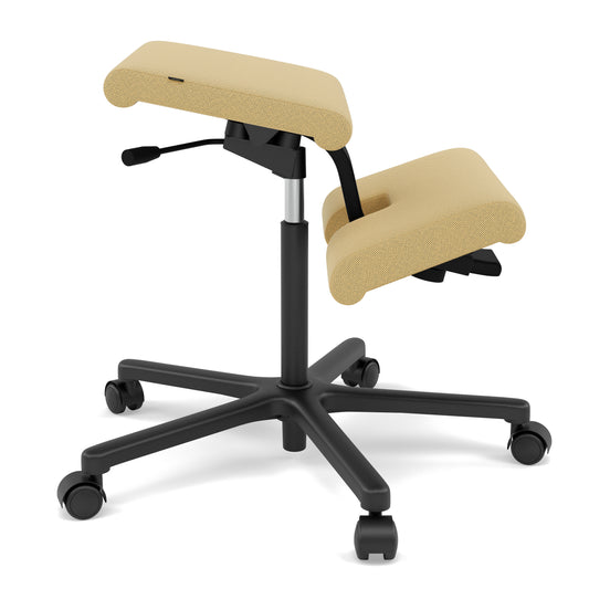 Varier Wing knestol i Tonal gul og svart understell. Bestillingsvare.