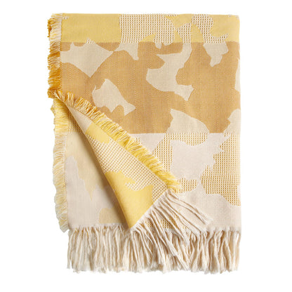 Plesner Patterns "Heritage" pledd i gult.